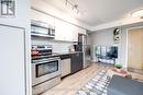 402 - 20 Joe Shuster Way, Toronto, ON  - Indoor Photo Showing Kitchen 