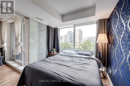 402 - 20 Joe Shuster Way, Toronto, ON - Indoor Photo Showing Bedroom