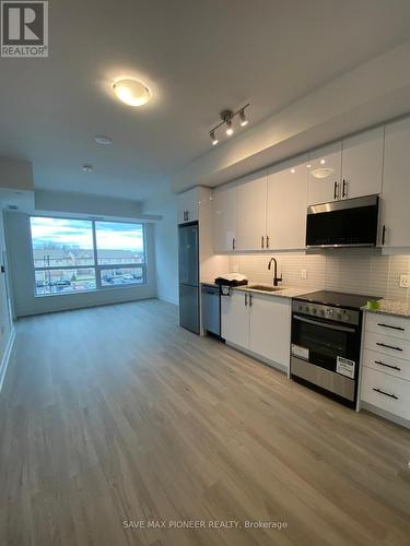 305 - 2333 Khalsa Gate, Oakville, ON - Indoor Photo Showing Kitchen With Upgraded Kitchen