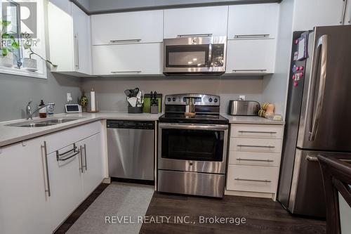 16 - 3200 Singleton Avenue, London, ON - Indoor Photo Showing Kitchen With Stainless Steel Kitchen With Double Sink