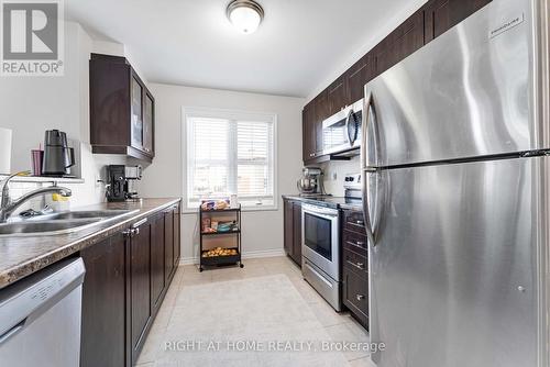 74 Feathertop Lane, Ottawa, ON - Indoor Photo Showing Kitchen With Stainless Steel Kitchen With Double Sink