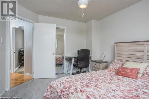 Bedroom with ceiling fan and light hardwood / wood-style flooring - 134 Bayne Crescent, Cambridge, ON 