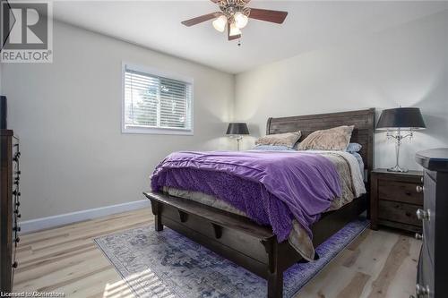 Bedroom with ceiling fan and light hardwood / wood-style floors - 134 Bayne Crescent, Cambridge, ON 