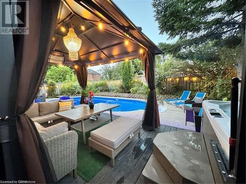 View of patio with a fenced in pool, outdoor lounge area, and a gazebo - 134 Bayne Crescent, Cambridge, ON 