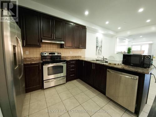 63 Lorenzo Circle, Brampton, ON - Indoor Photo Showing Kitchen With Stainless Steel Kitchen With Double Sink