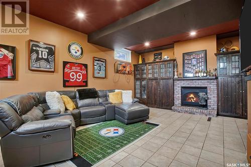 414 Charlebois Court, Saskatoon, SK - Indoor Photo Showing Living Room With Fireplace