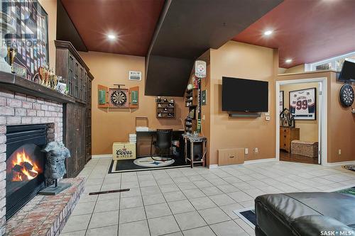 414 Charlebois Court, Saskatoon, SK - Indoor Photo Showing Other Room With Fireplace