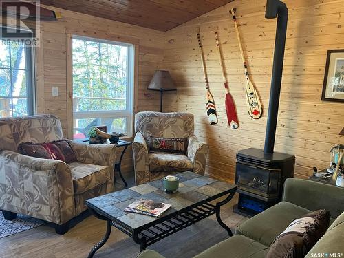 1 Birch Place, Tobin Lake, SK - Indoor Photo Showing Living Room With Fireplace