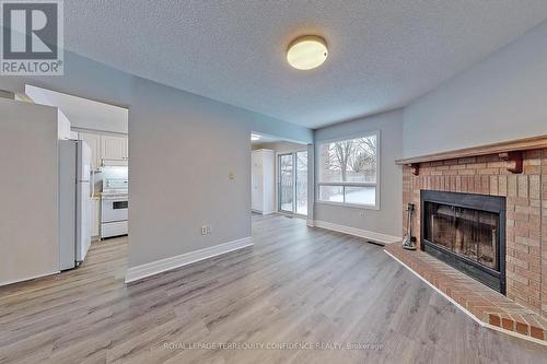 10 Weatherup Crescent, Barrie, ON - Indoor Photo Showing Living Room With Fireplace