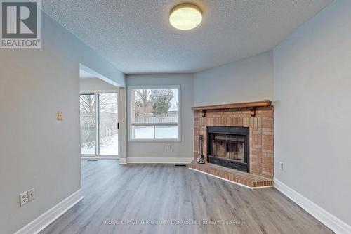 10 Weatherup Crescent, Barrie, ON - Indoor Photo Showing Living Room With Fireplace