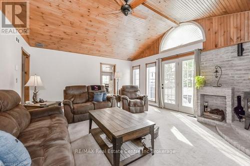 7416 Third Line, Wellington North, ON - Indoor Photo Showing Living Room With Fireplace