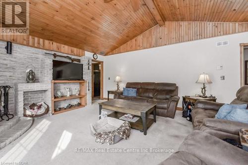 7416 Third Line, Wellington North, ON - Indoor Photo Showing Living Room With Fireplace