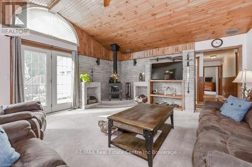 7416 Third Line, Wellington North, ON - Indoor Photo Showing Living Room With Fireplace