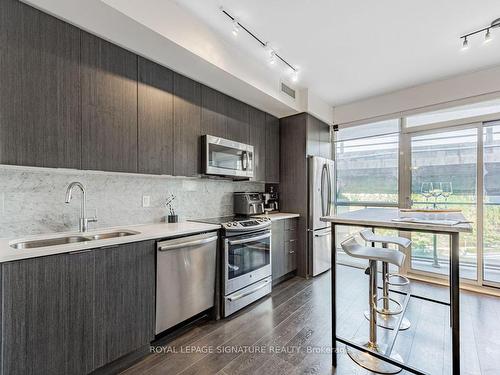 605-50 Bruyeres Mews, Toronto, ON - Indoor Photo Showing Kitchen With Stainless Steel Kitchen With Double Sink With Upgraded Kitchen