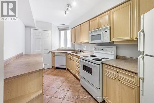 202 - 2365 Queen Street E, Toronto, ON - Indoor Photo Showing Kitchen With Double Sink