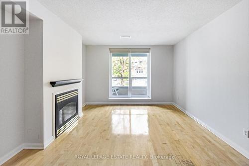 202 - 2365 Queen Street E, Toronto, ON - Indoor Photo Showing Other Room With Fireplace