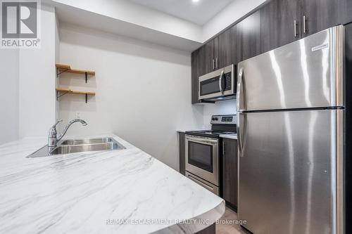 205 - 125 Shoreview Place, Hamilton, ON - Indoor Photo Showing Kitchen With Double Sink