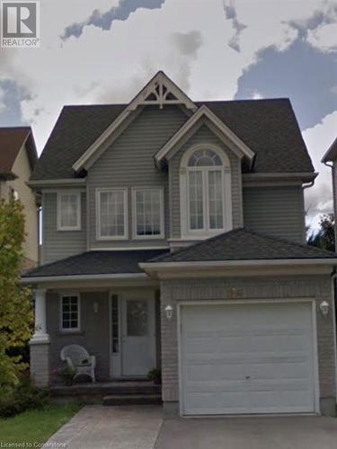 View of front of home featuring covered porch and a garage - 356 Havendale Crescent, Waterloo, ON - Outdoor With Facade