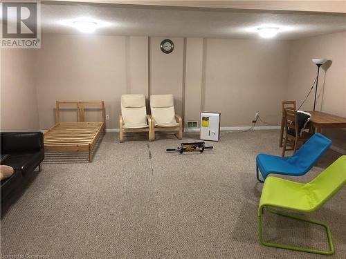 Living area with carpet and a textured ceiling - 356 Havendale Crescent, Waterloo, ON - Indoor