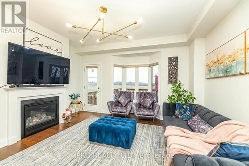 7 Dalbeattie Drive, Brampton, ON - Indoor Photo Showing Living Room With Fireplace