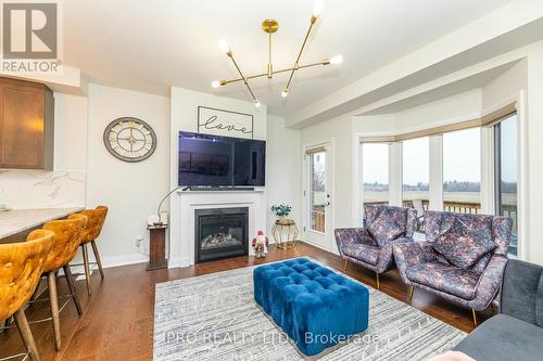 7 Dalbeattie Drive, Brampton, ON - Indoor Photo Showing Living Room With Fireplace