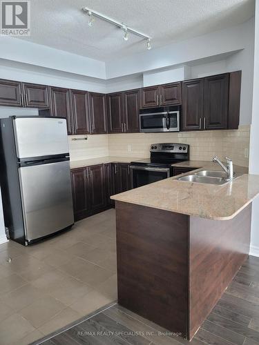 3505 - 3504 Hurontario Street, Mississauga, ON - Indoor Photo Showing Kitchen With Double Sink