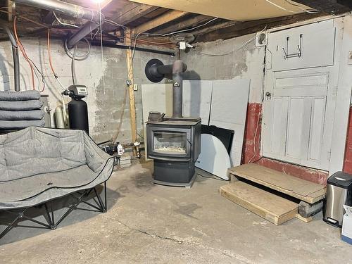 Salle de lavage - 242 Ch. Du Lac-Cameron, Saint-Eugène-De-Guigues, QC - Indoor Photo Showing Basement