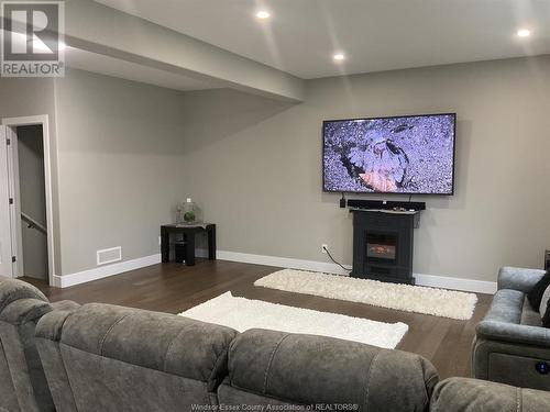 133 Churchill Park, Chatham, ON - Indoor Photo Showing Living Room With Fireplace