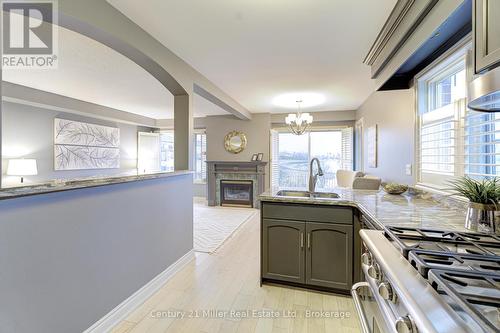 487 Dewitt Road, Hamilton (Lakeshore), ON - Indoor Photo Showing Kitchen With Fireplace