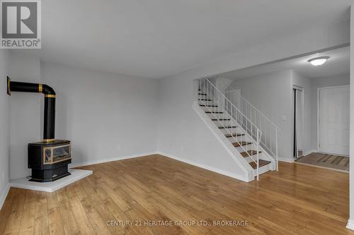 47 Trillium Court, Kingston (Rideau), ON - Indoor Photo Showing Other Room With Fireplace