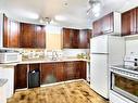 Cuisine - 11472 Boul. Témiscamingue, Rouyn-Noranda, QC  - Indoor Photo Showing Kitchen With Double Sink 