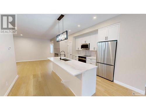 4824 Ridge Road Unit# 4, Radium Hot Springs, BC - Indoor Photo Showing Kitchen With Stainless Steel Kitchen With Double Sink