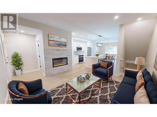 4824 Ridge Road Unit# 4, Radium Hot Springs, BC - Indoor Photo Showing Living Room With Fireplace