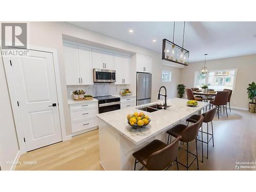 4824 Ridge Road Unit# 4, Radium Hot Springs, BC - Indoor Photo Showing Kitchen With Stainless Steel Kitchen With Double Sink With Upgraded Kitchen