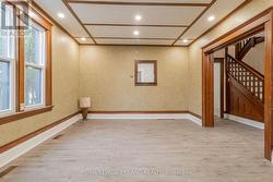 Formal dining area or main level bedroom - 