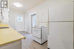 Kitchen w/ exit to backyard - 