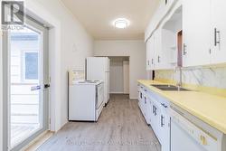 Kitchen w/ exit to backyard - 