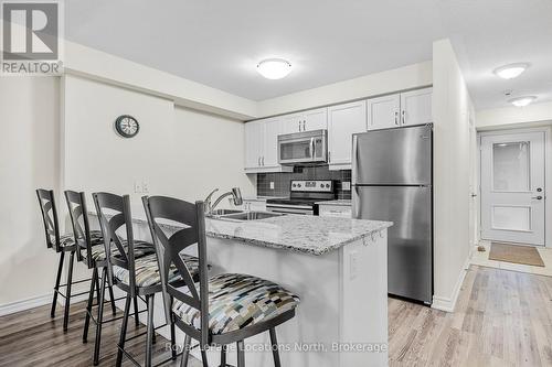 104 - 4 Anchorage Crescent, Collingwood, ON - Indoor Photo Showing Kitchen With Stainless Steel Kitchen With Double Sink