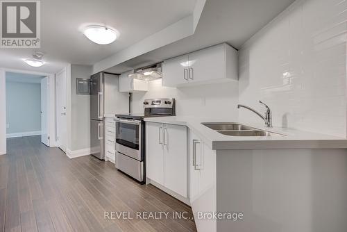 Bsmt - 1064 College Street, Toronto, ON - Indoor Photo Showing Kitchen With Double Sink