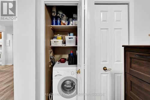 702 - 293 Mohawk Road E, Hamilton, ON - Indoor Photo Showing Laundry Room