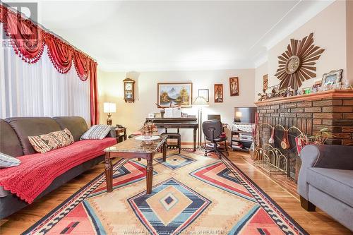 1236 Hickory, Windsor, ON - Indoor Photo Showing Living Room With Fireplace