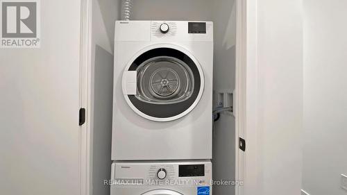 4802 - 55 Charles Street E, Toronto, ON - Indoor Photo Showing Laundry Room