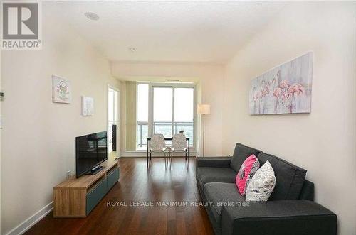 3605 - 4070 Confederation Parkway, Mississauga, ON - Indoor Photo Showing Living Room With Fireplace