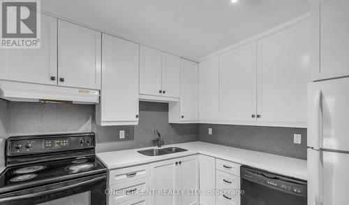 23J - 1910 Jasmine Crescent, Ottawa, ON - Indoor Photo Showing Kitchen With Double Sink