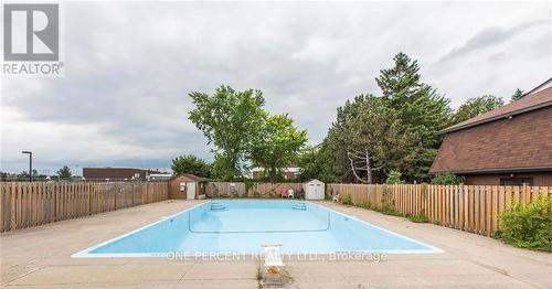 23J - 1910 Jasmine Crescent, Ottawa, ON - Outdoor With In Ground Pool With Backyard