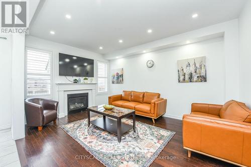 86 Rockbrook Trail, Brampton, ON - Indoor Photo Showing Living Room With Fireplace