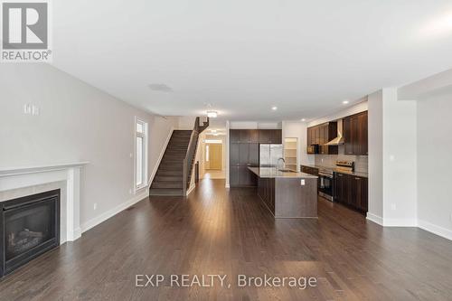 632 Moonflower Crescent S, Ottawa, ON - Indoor Photo Showing Other Room With Fireplace