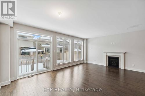 632 Moonflower Crescent S, Ottawa, ON - Indoor Photo Showing Living Room With Fireplace