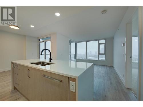 1588 Ellis Street Unit# 1402, Kelowna, BC - Indoor Photo Showing Kitchen With Double Sink