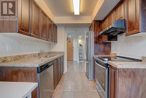 303 - 238 Doris Avenue, Toronto, ON - Indoor Photo Showing Kitchen With Double Sink